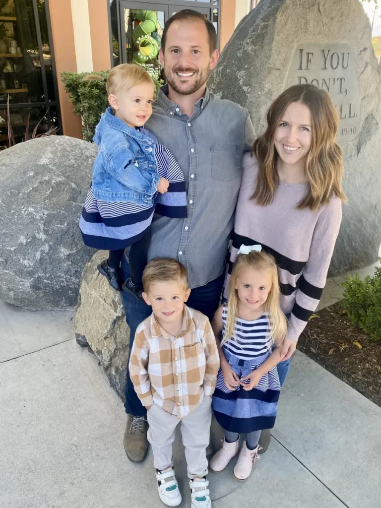 Balancing Life with Littles creator and family posing for a family photo